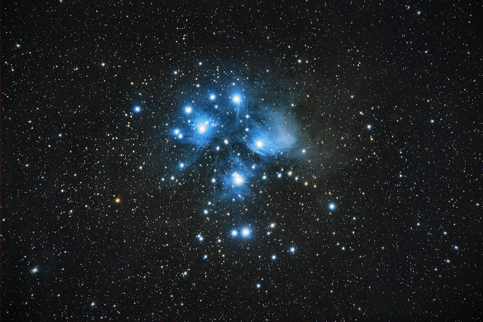 Photo by Arnaud Mariat black, blue, and white stars